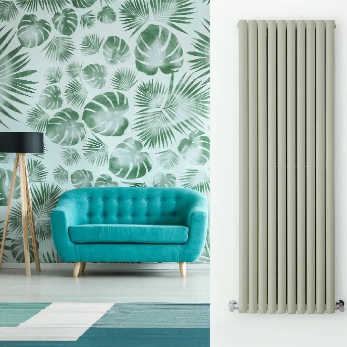 sage green radiator in a green living room