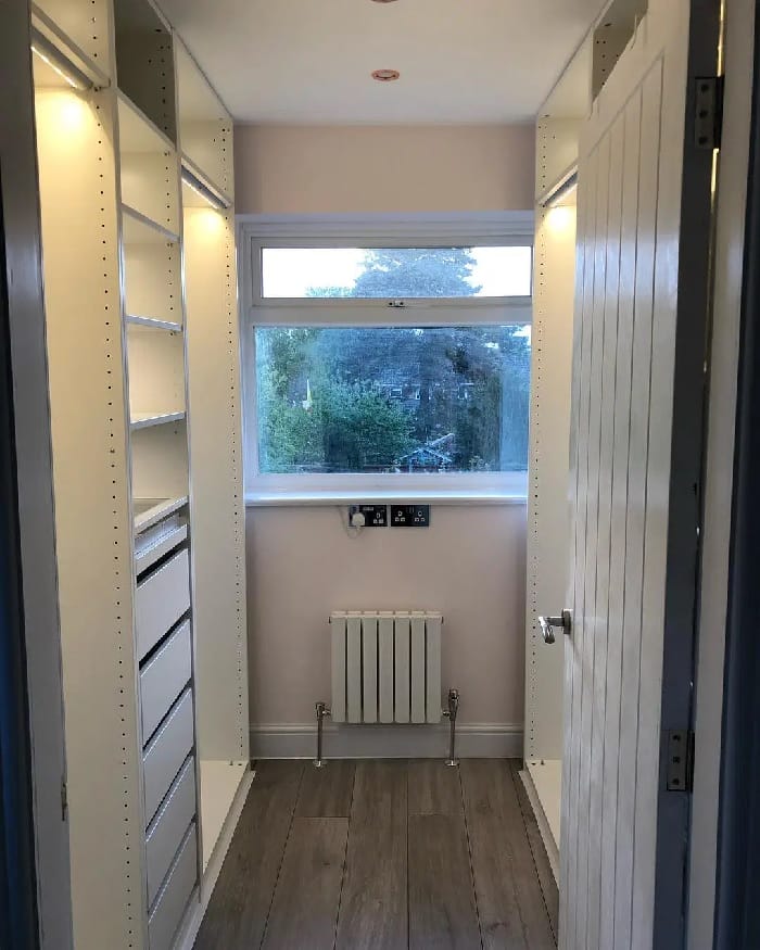 tiny aruba radiator in a small walk in wardrobe