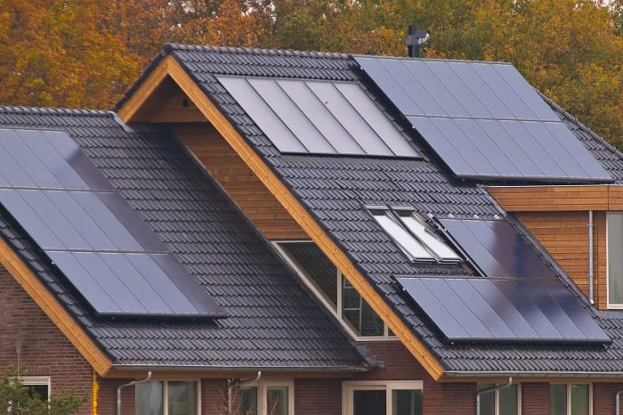 Solar panels on roof of house Solar panels on a black roof of a house