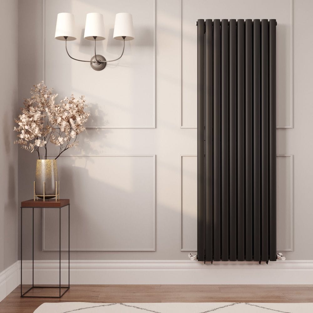 milano aruba vertical black designer radiator near artificial house plant