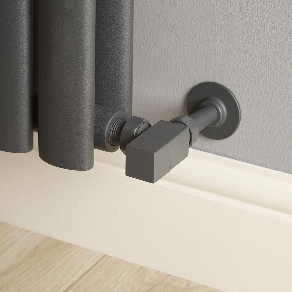 Milano modern anthracite square angled valve on light grey wall attached to modern radiator