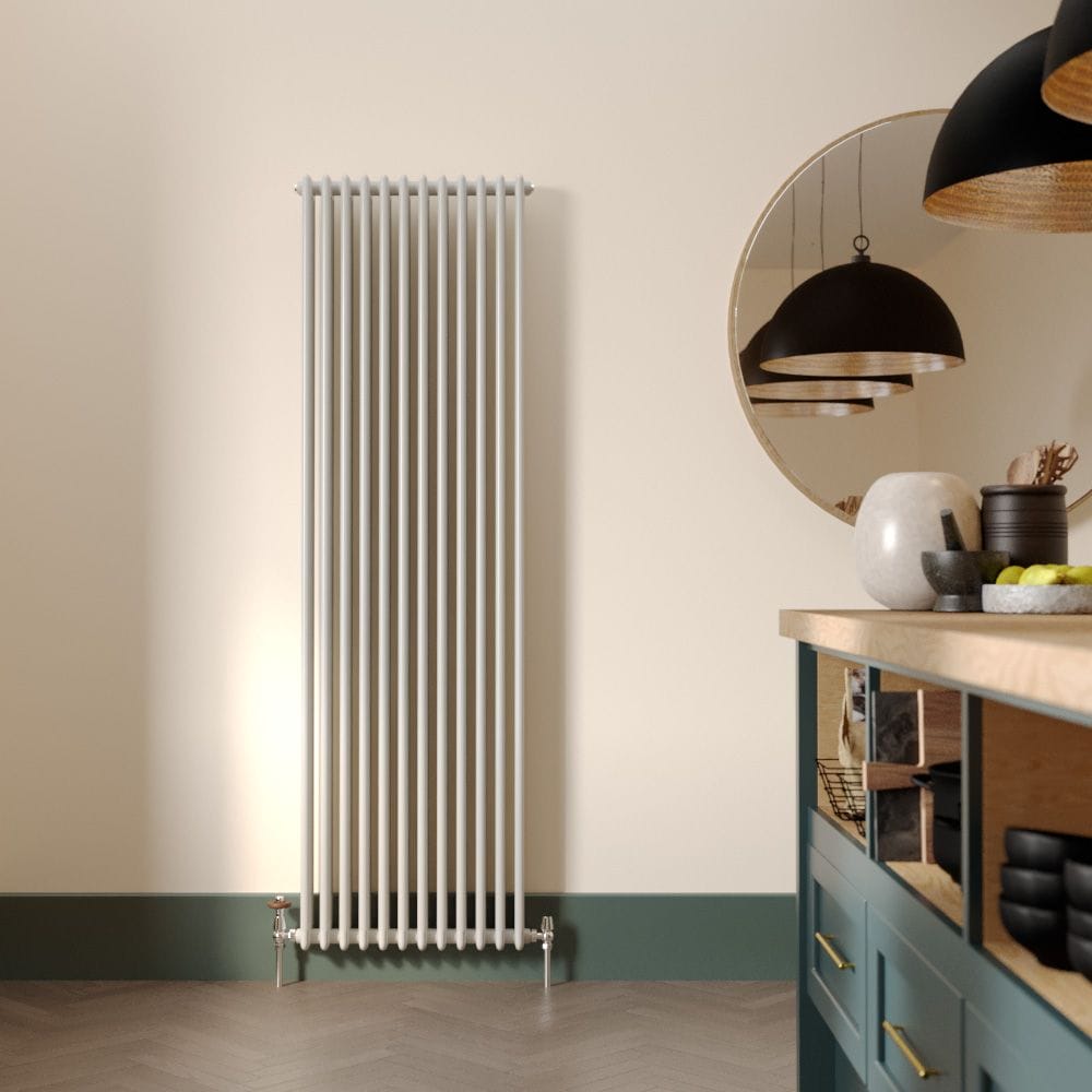 Milano Windsor white traditional vertical triple column radiator on white wall nearby large mirror and modern worktop