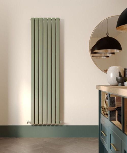 resized ladies in the kitchen with vertical radiator Milano Aruba vertical green radiator in modern kitchen