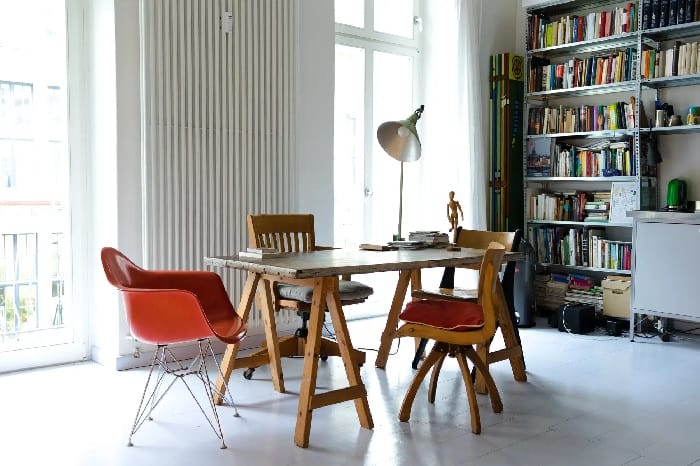 vertical column radiator in a dining room Vertical column radiator in a dining room