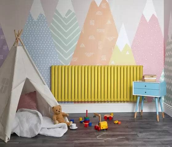 yellow aruba radiator in a playroom