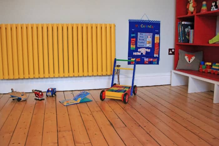 yellow radiator in a playroom
